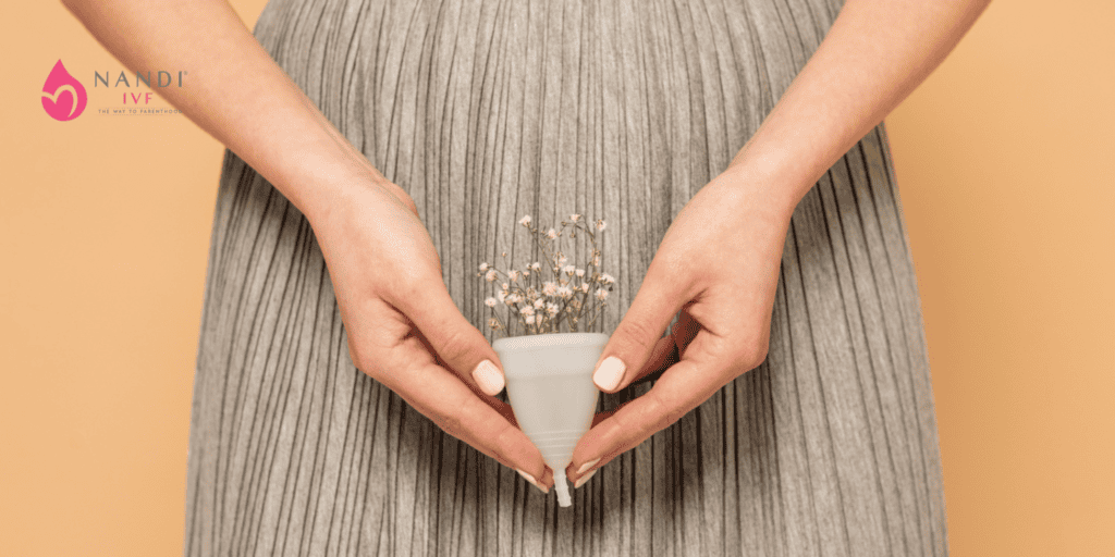 Woman holding a small container for fertility preservation or egg freezing.